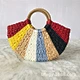The new round bucket grass woven fashion simple hand-braided paper rope retro moon bag straw bag